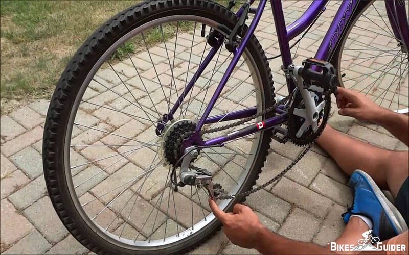 How to Put a Bike Chain Back on the Gears