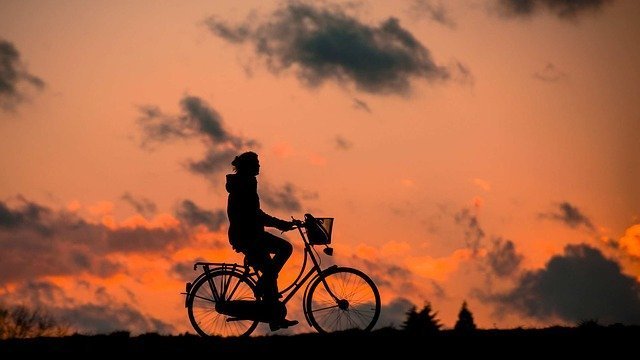 Cycling woman enjoying life